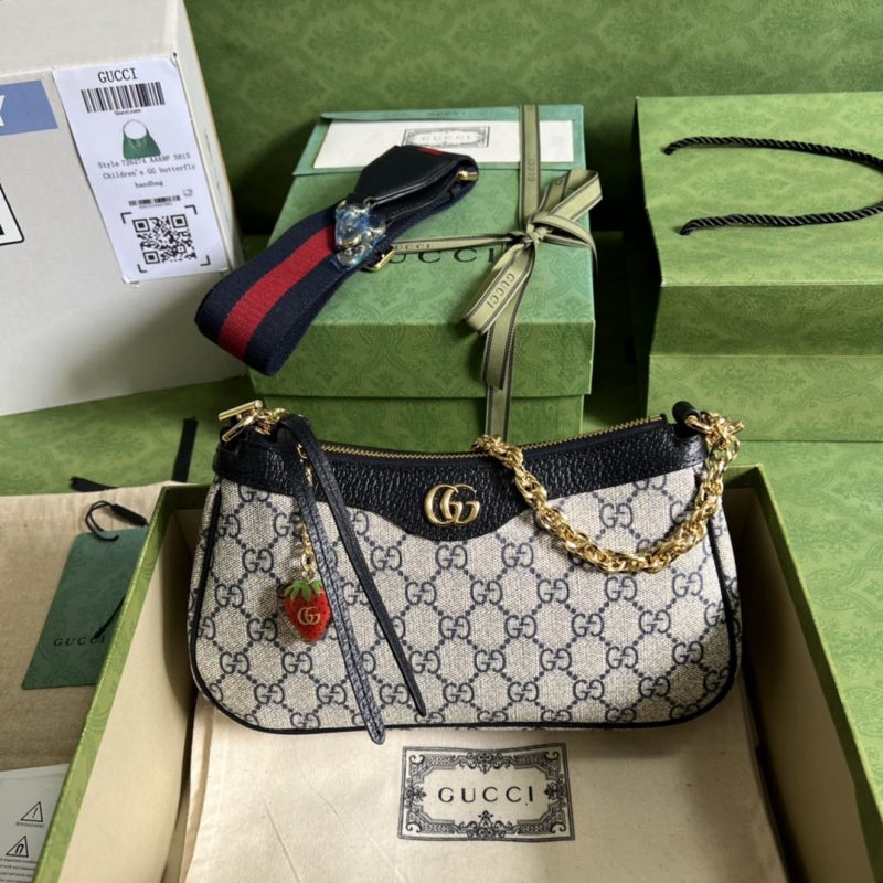 G*u*i top handle bags